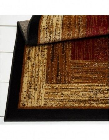 A brown and red rug with a black border