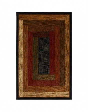 A picture of a quilt in a wooden frame on a white background.