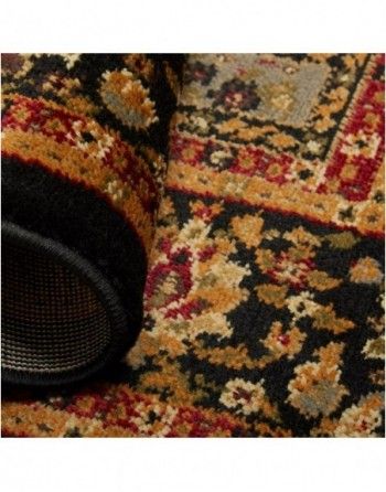 A close up of a rug with a floral pattern