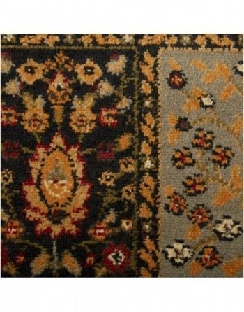 A close up of a rug with a floral pattern on it