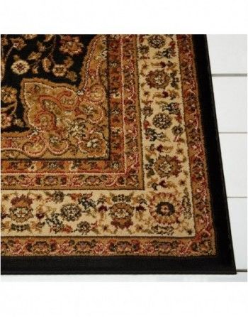 A close up of a rug with a black border