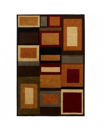 A brown and red rug with squares on it