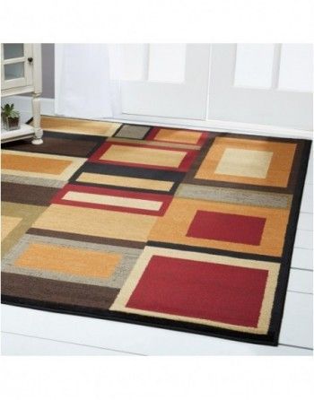 A colorful rug with squares and rectangles on it