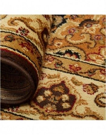 A close up of a rolled up rug with a pattern on it.