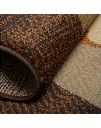 A close up of a rug with a pattern on it.