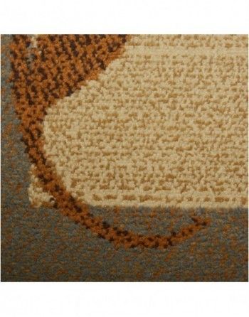 A close up of a rug with a pattern on it.