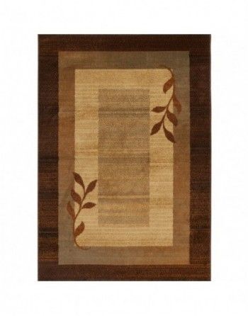 A brown and tan rug with leaves on it