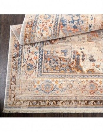 A rug is sitting on top of a wooden table.