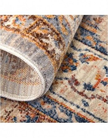 A close up of a rug with a pattern on it.