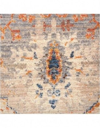 A close up of a rug with a pattern on it.