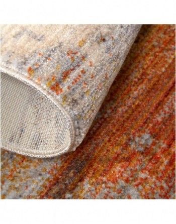 A close up of a rug with a pattern on it.