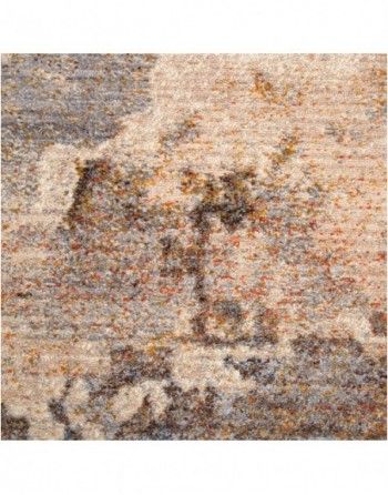 A close up of a rug with a pattern on it.