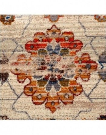 A close up of a rug with a floral pattern on it.