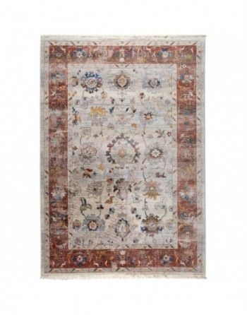 A rug with a floral pattern and a red border on a white background.