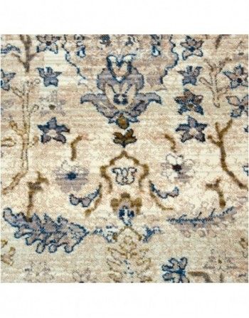 A close up of a rug with a floral pattern