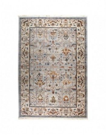 A rug with a floral pattern on it is on a white background.