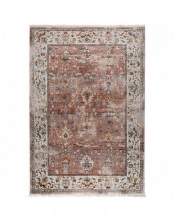 A rug with a floral pattern on it is on a white background.