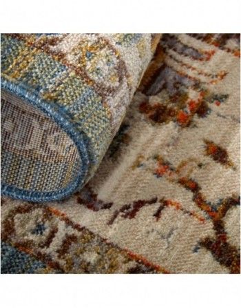 A close up of a rug with a floral pattern on it.