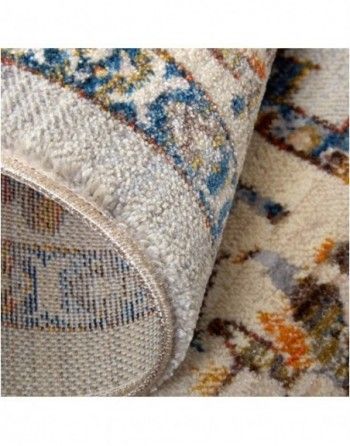 A close up of the back of a rug with a pattern on it.