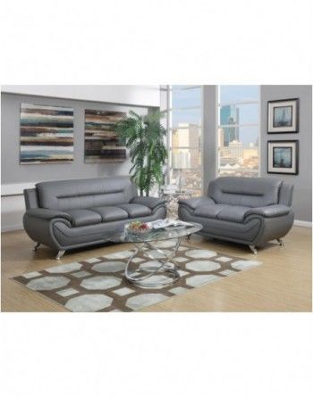 A living room with two grey couches and a coffee table