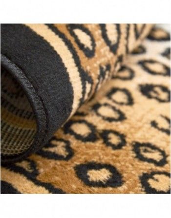 A close up of a leopard print rug