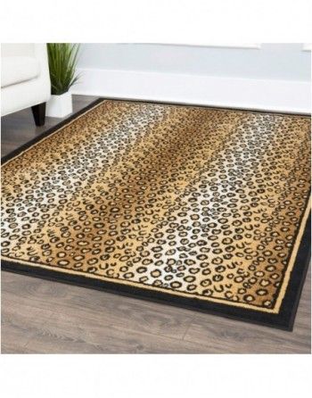 A leopard print rug is sitting on a wooden floor in a living room.