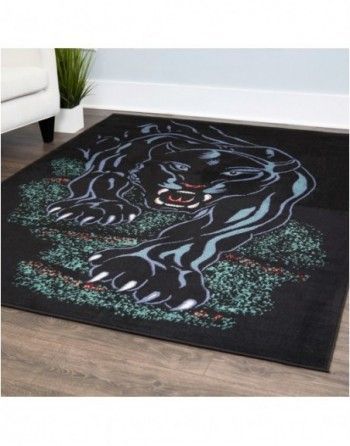 A black rug with a picture of a panther on it