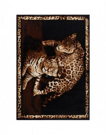A picture of a leopard and a baby leopard on a rug