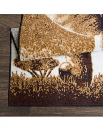 A rug with a picture of a deer on it is on a wooden floor.