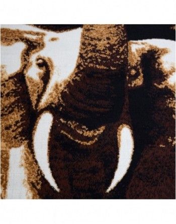 A close up of an elephant 's trunk and tusks