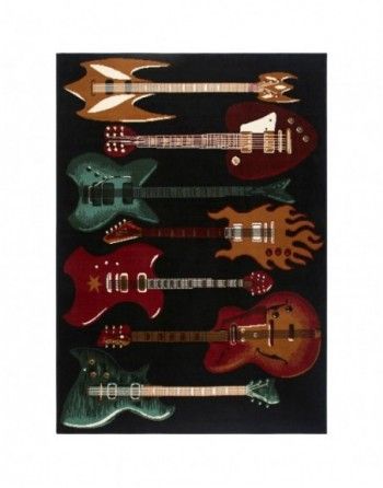 Several guitars are lined up on a black background