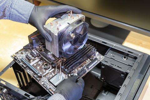 Professional IT Technician Upgrading Computer Hardware