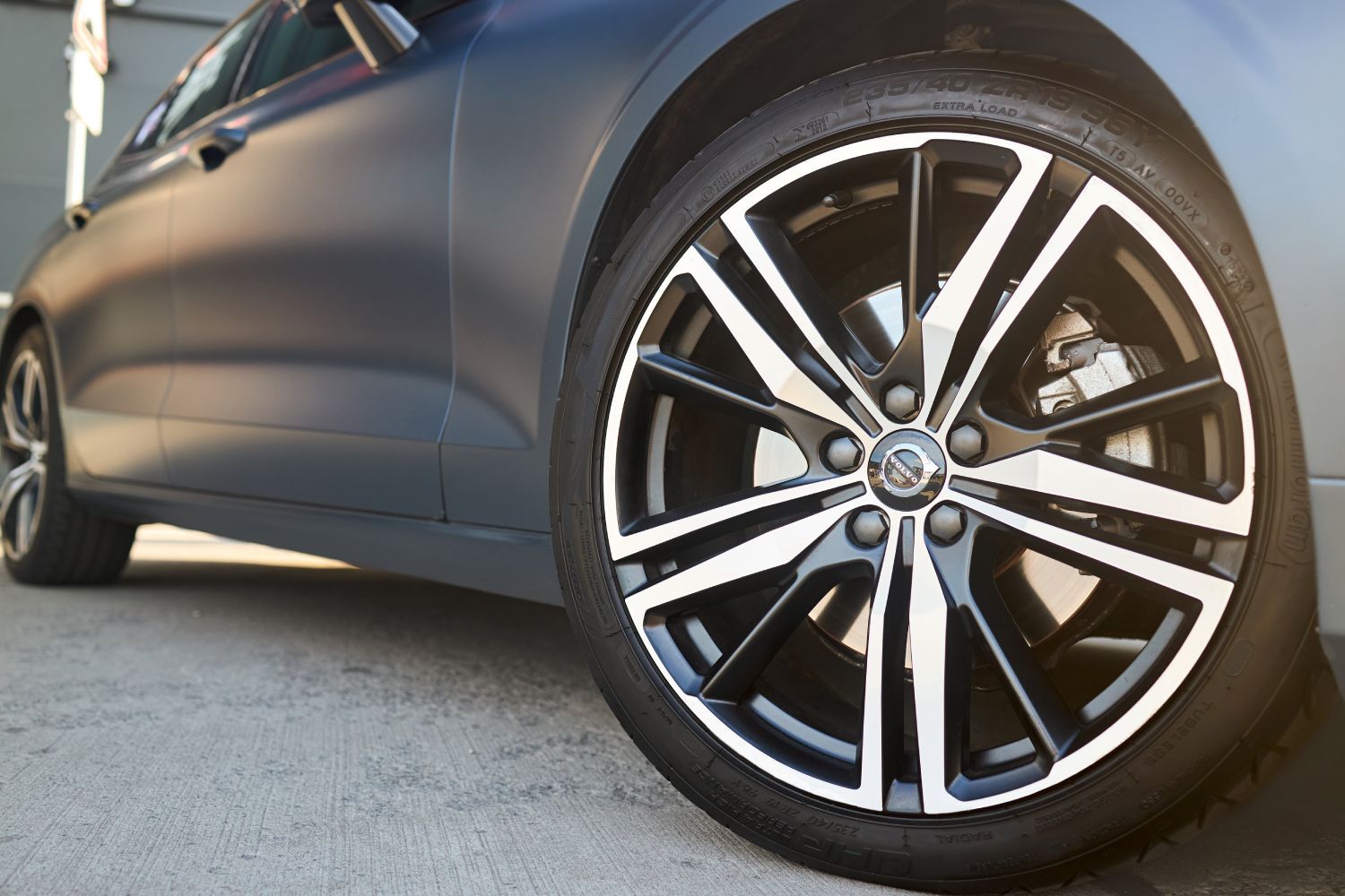 a close up of a car wheel with a tire on it