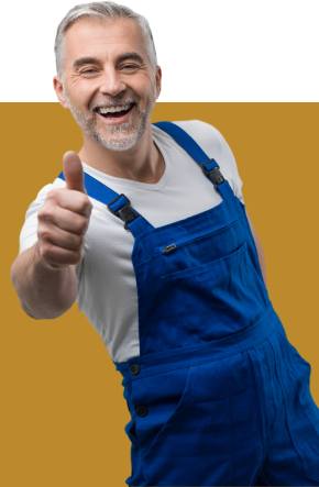 a man in blue overalls is giving a thumbs up