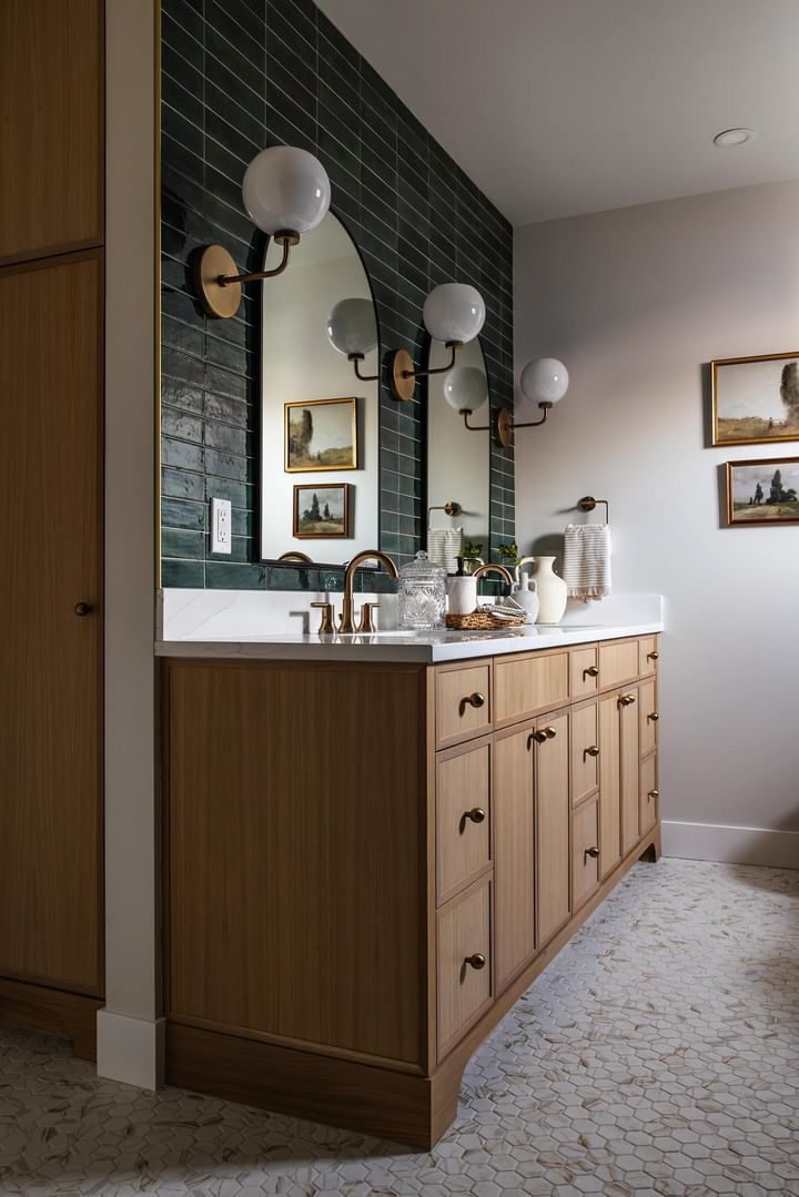the front of a house with a glass garage door and steps leading up to it .
