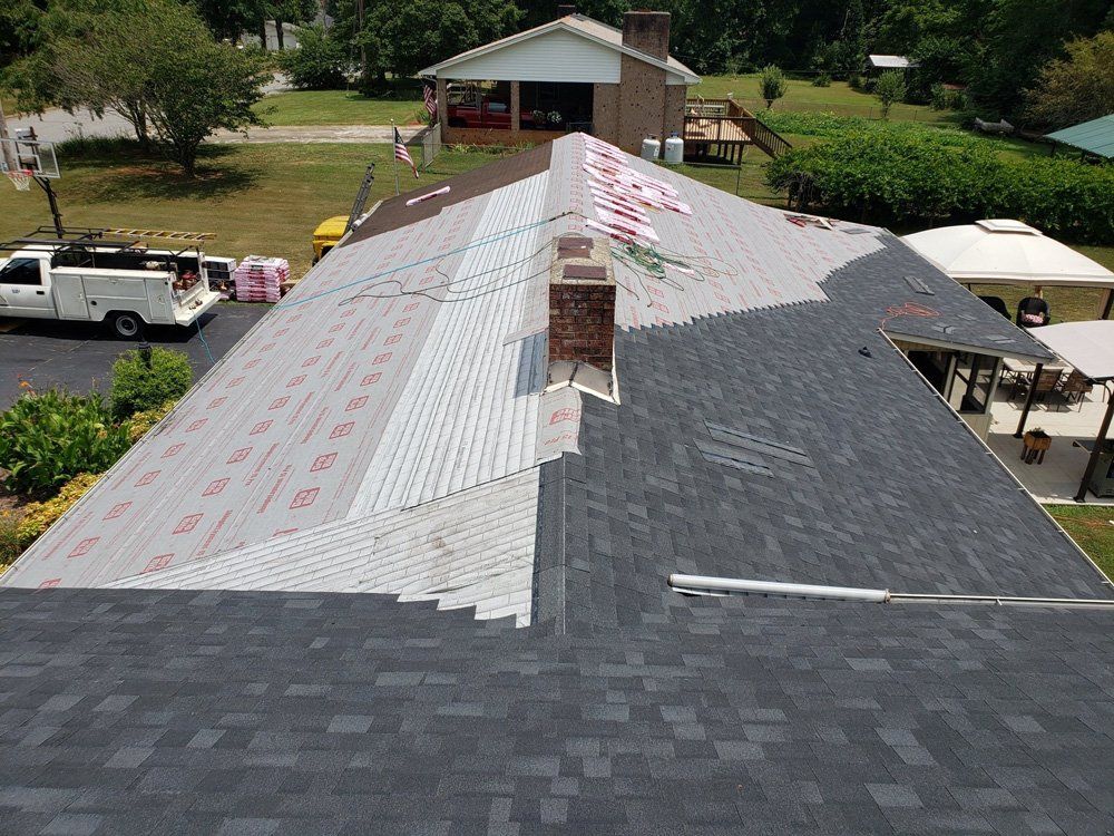 Installing New Roof — Hickory, NC — Piedmont Roofing & Siding