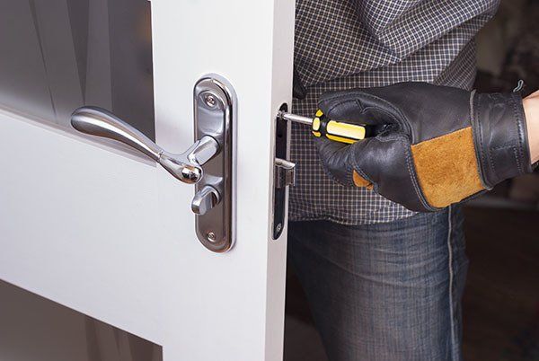 Door lock being repaired