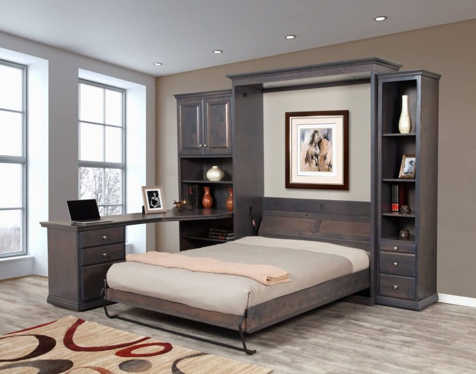 A bedroom with a large bed and a rug