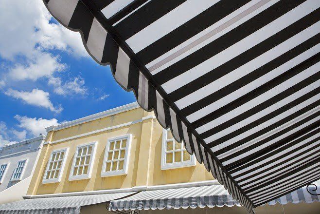 Black And White Striped Awning — Louisville, KY — Lexington Tent & Awning Company