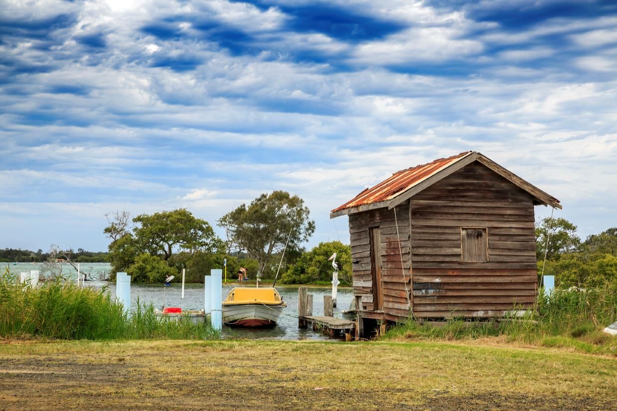 The Waves Are Crashing Against The Rocks On The Beach — NCM Towing Newcastle In Taree, NSW