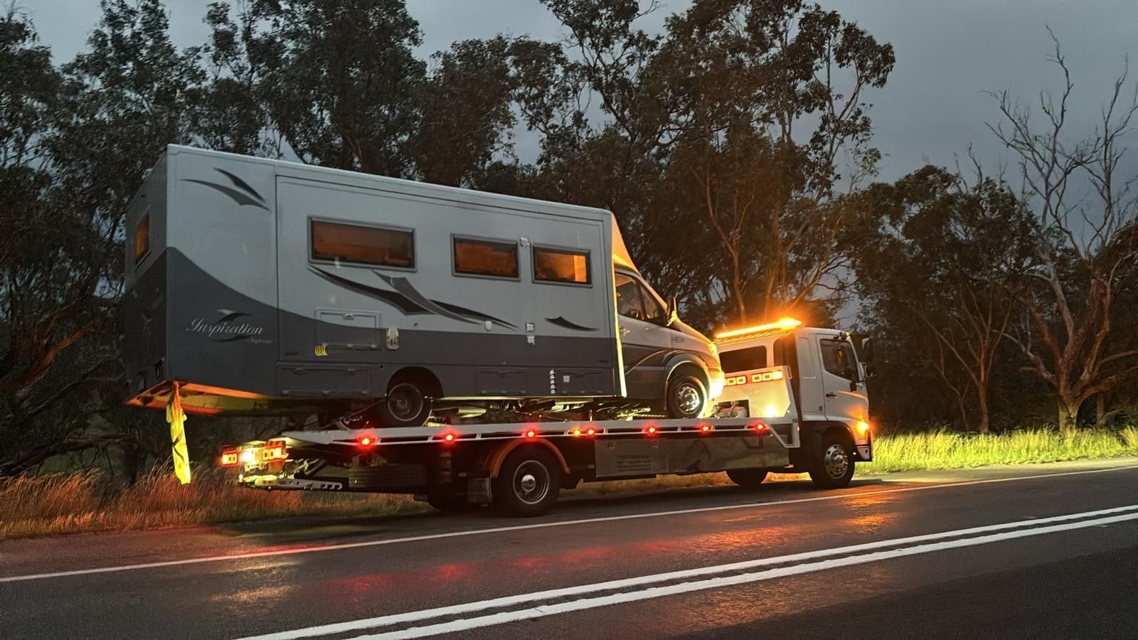 Tow Truck Carries a Large RV