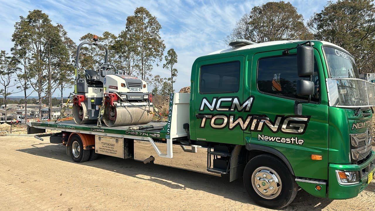 Machinery Loaded in A Tow Truck