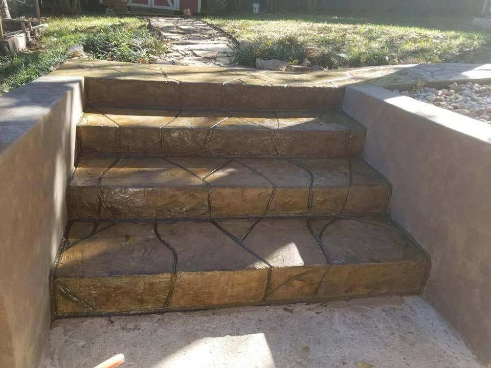 A set of stairs leading up to a house.