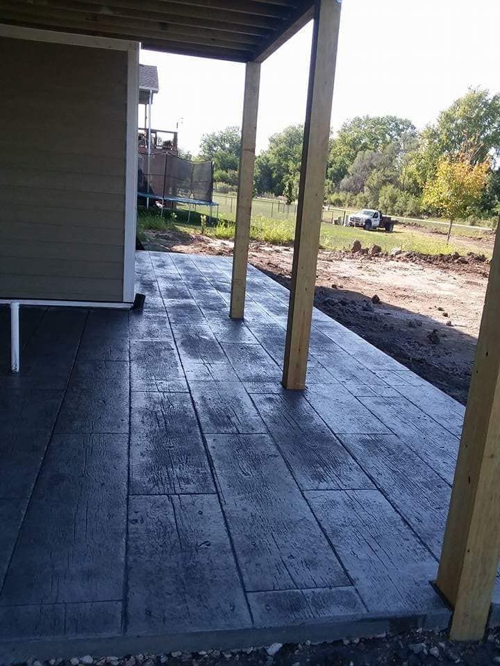 A patio with a covered area underneath it