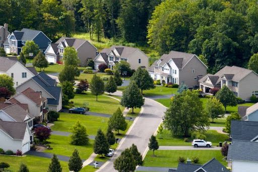 An aerial view of a suburban neighborhood with a selection of spacious single-family homes for sale in Rocklin, CA