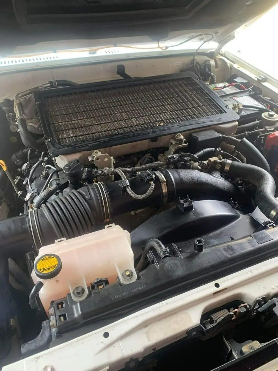 A Close up Of a Car Engine with The Hood Open — Pacific Plaza Automotive in Port Macquarie, NSW