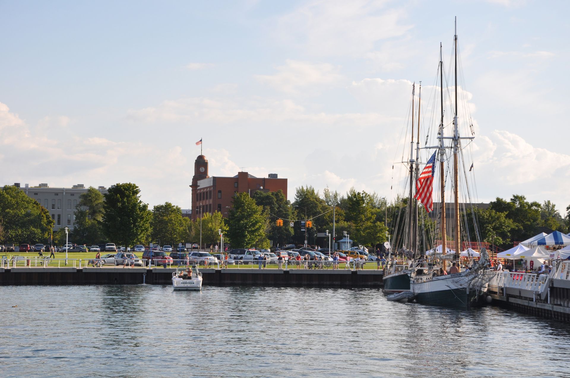 Boats Are Docked in A Harbor with A Building in The Background - Rochester Hills, MI - J & B Doors
