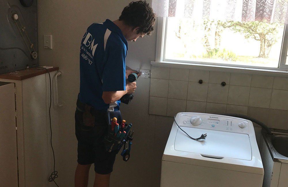A Power Outlet Being Installed — Electricians in the Seaforth, QLD