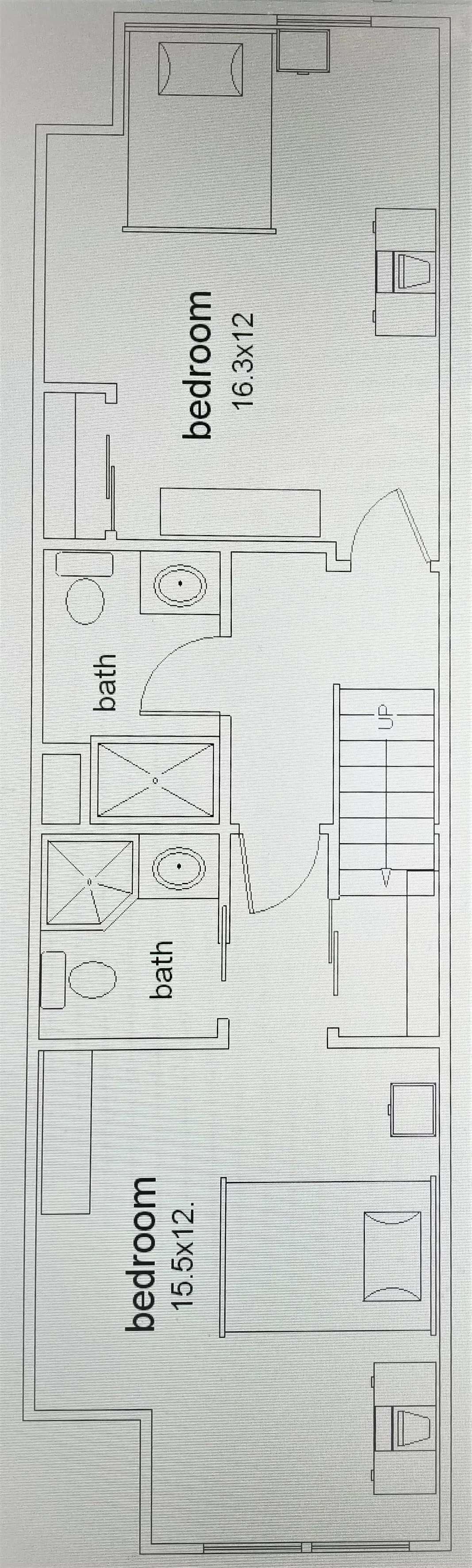 A black and white floor plan of a house.