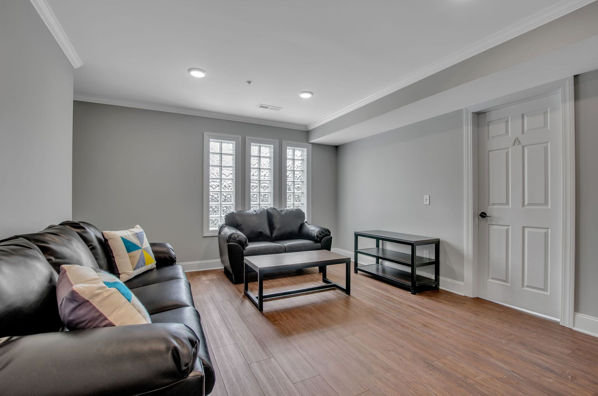 There is a couch and a coffee table in the living room.